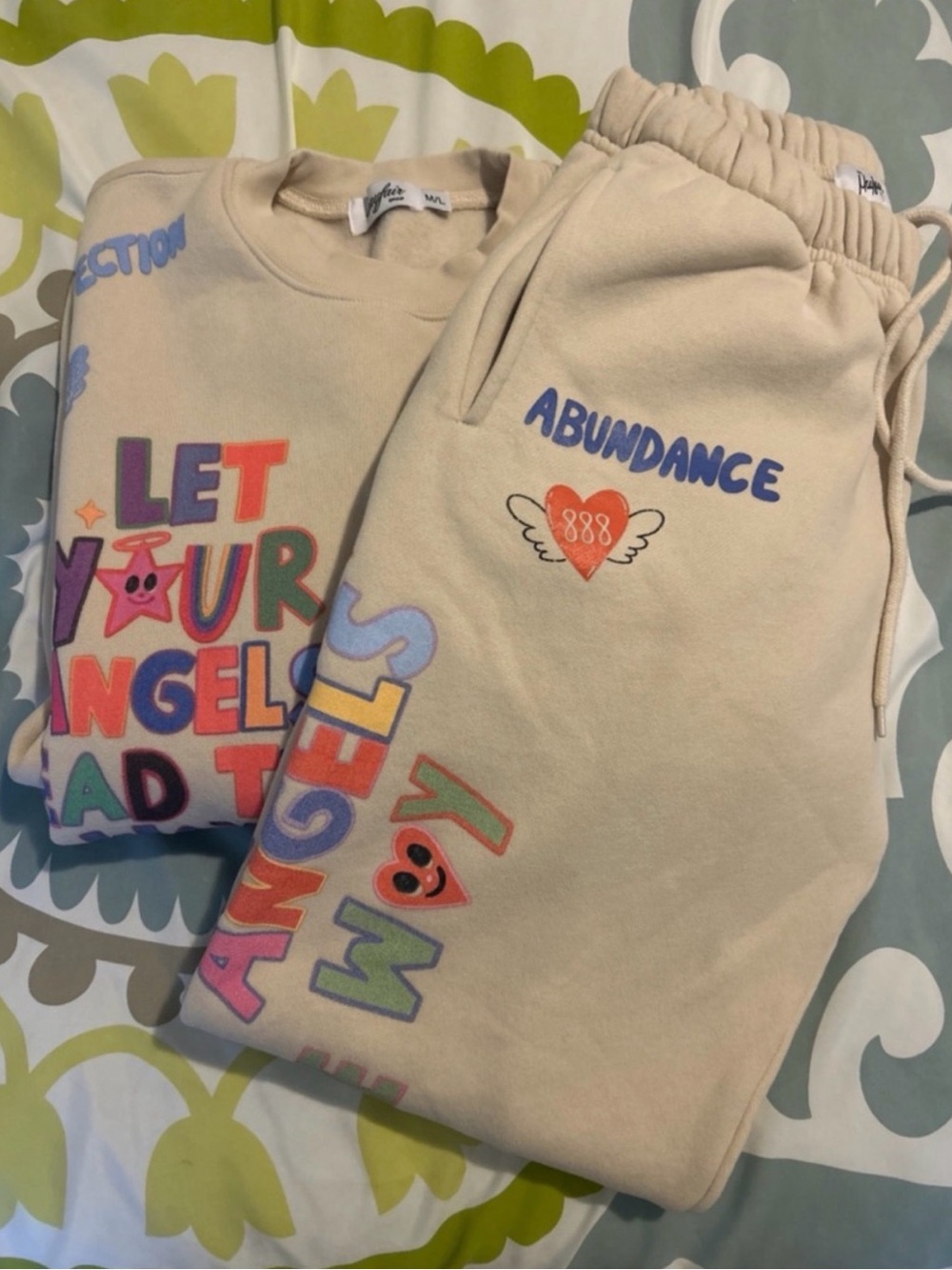 Let Your Angels Lead The Way Beige Graphic Sweatpants - Abundance Print
